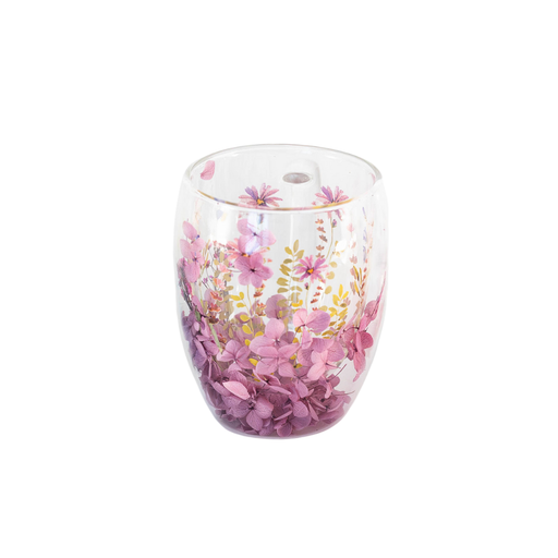 Clear glass tumbler with pink floral design on a white background