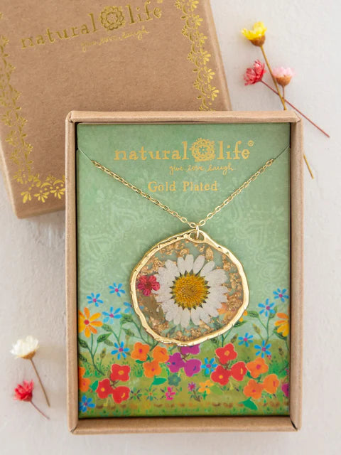 Gold-plated necklace with a floral design in a 'natural life' branded box.