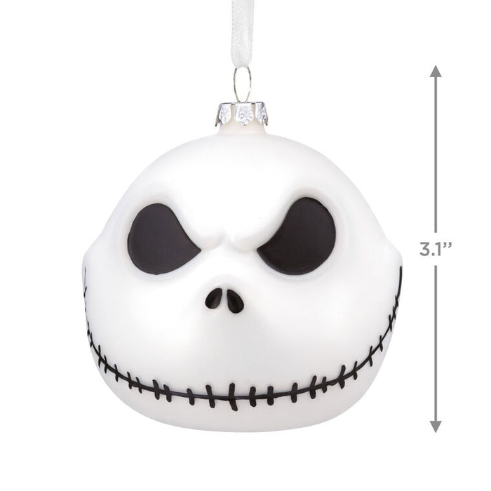 White ornament with black eye design and measurement label on a white background
