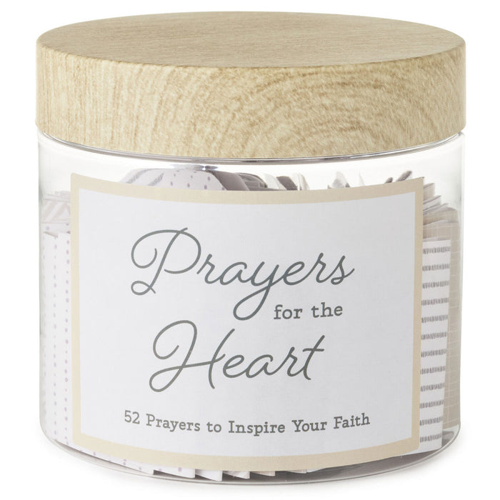 Jar labeled 'Prayers for the Heart' with a wooden lid on a white background