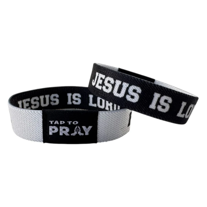 Two wristbands with 'Jesus is Lord' text on a white background