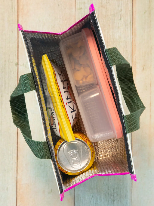 Small pouch with a yellow tool, can, and other items on a wooden surface