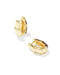 A pair of gold huggie hoop earrings with a bamboo-inspired segmented design and dark brown enamel accents, shown on a clean white background.