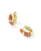 A pair of gold hoop earrings with curved terracotta orange enamel inlays, displayed on a clean white background with soft shadows.