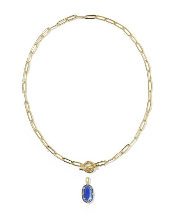 A gold paperclip chain necklace with a toggle clasp and a small oval blue gemstone pendant, shown on a plain white background.