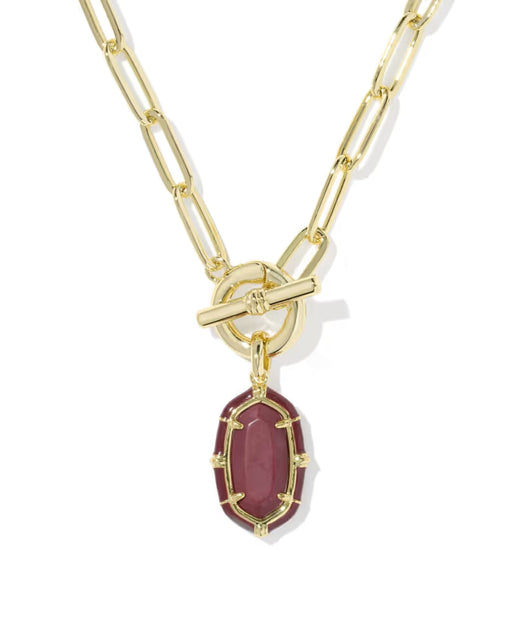 Gold necklace with a teardrop-shaped diamond pendant on a white background