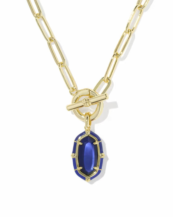 A gold paperclip chain necklace with a toggle clasp and a blue oval pendant, shown on a clean white background.