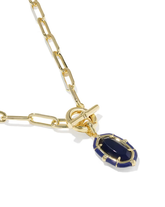 A gold chain necklace featuring a toggle clasp and a teardrop-shaped pendant with a deep blue enamel center and gold bezel, shown on a clean white background.
