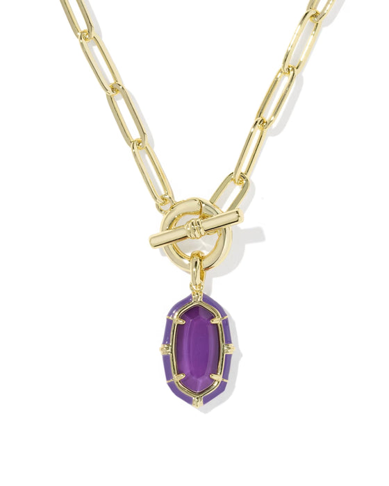 A gold paperclip chain necklace with a toggle clasp and a purple oval gemstone pendant, shown on a clean white background.