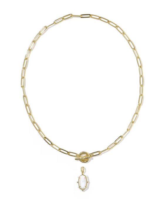 A gold paperclip chain necklace with a toggle clasp and a small oval pendant, shown on a plain white background.