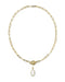 A gold paperclip chain necklace with a toggle clasp and a small oval pendant, shown on a plain white background.