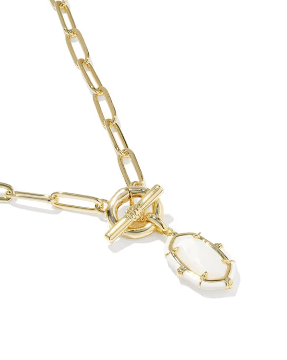 Gold chain necklace with a toggle clasp and a dangling white oval pendant, shown on a clean white background.