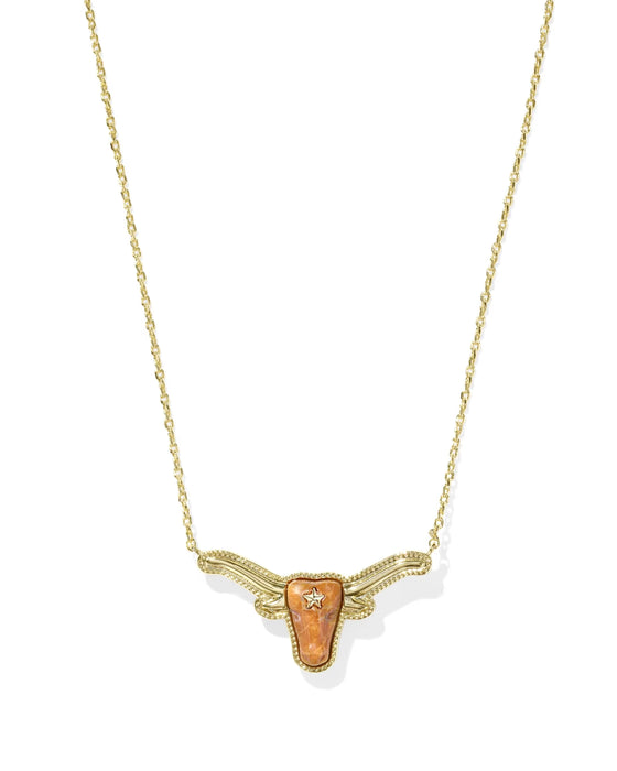 A gold chain necklace featuring a Texas longhorn pendant with a textured orange stone and a small clear crystal accent, shown on a plain white background.