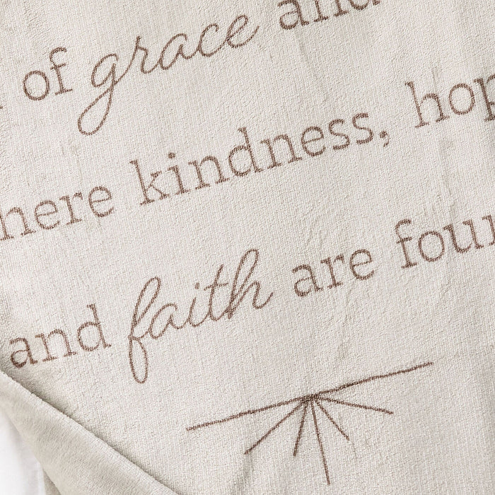 Textured fabric with embroidered text and design