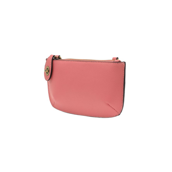 Pink pouch with a gold zipper on a white background
