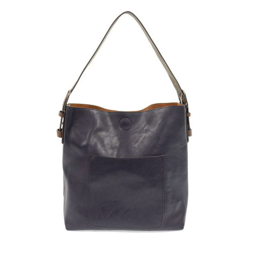 Dark blue leather handbag with a shoulder strap on a white background