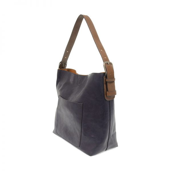 Gray shoulder bag with brown strap on a white background