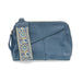 Blue pouch with a decorative strap on a white background