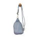 Blue suede crossbody bag with a strap on a white background