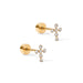 Pair of gold stud earrings with small gemstones on a white background