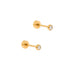 Pair of gold stud earrings with clear gemstones on a white background