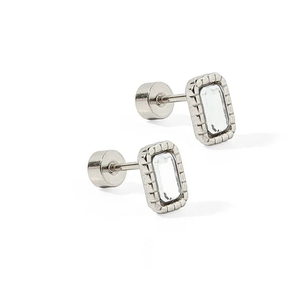 Pair of silver earrings on a white background