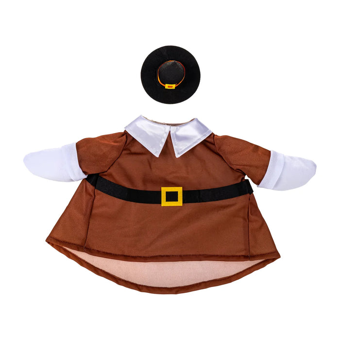 Dog costume with brown outfit, white shirt, and black hat on a white background