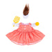 Pink dress, checkered paddle, and yellow pickle ball on a white background