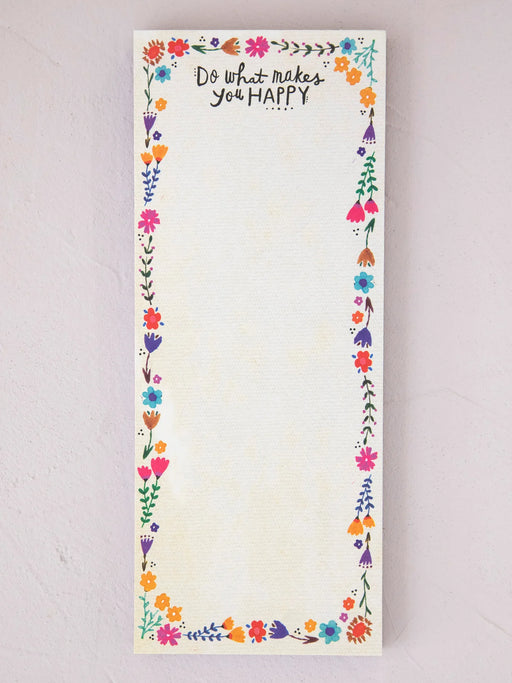 Notepad with floral border and motivational quote on a light background