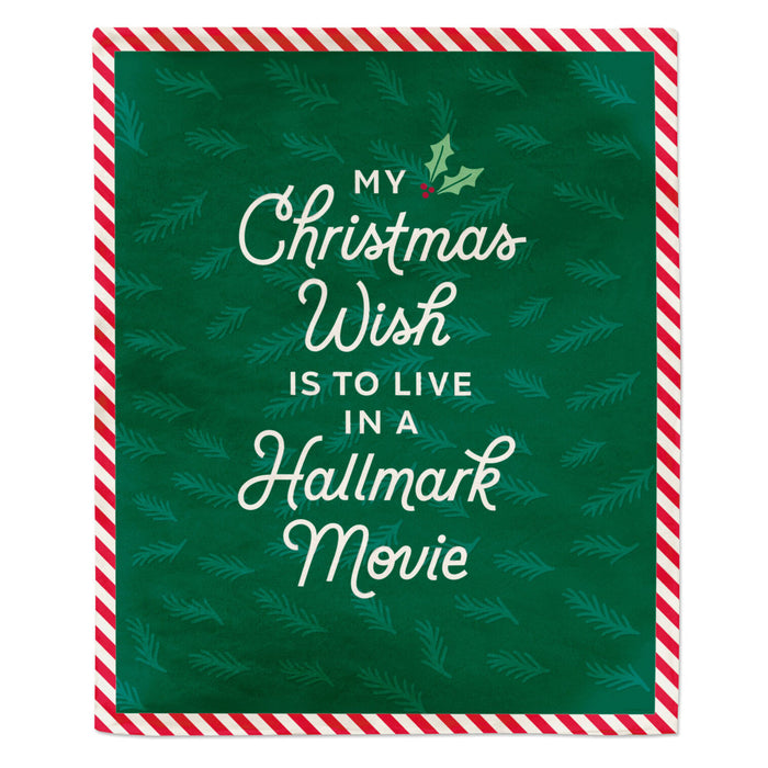 Christmas-themed card with text 'My Christmas wish is to live in a Hallmark movie' on a green background with red and white striped border.