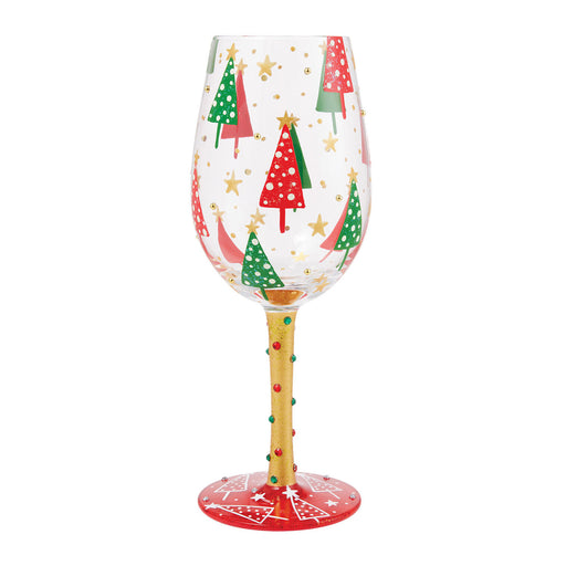 Wine glass with Christmas tree design on a white background
