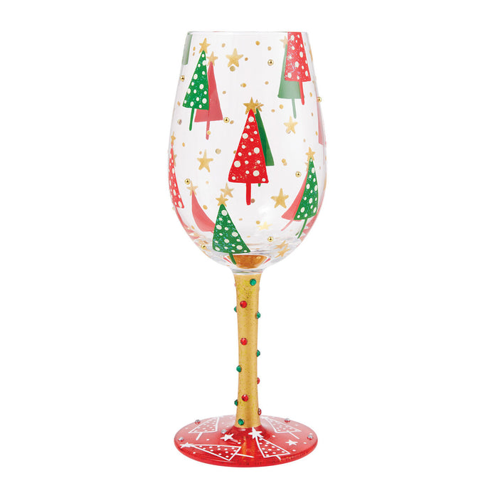 Wine glass with Christmas tree design on a white background