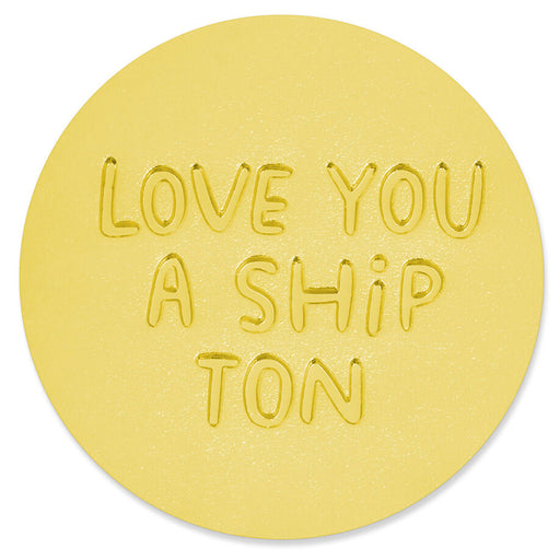 Round yellow sticker with 'LOVE YOU A SHIP TON' text on a white background