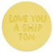 Round yellow sticker with 'LOVE YOU A SHIP TON' text on a white background