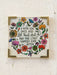 Decorative sign with floral design and humorous quote on a light background