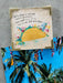 Card with a taco illustration and motivational quote on a textured surface