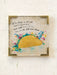 Framed artwork with a taco and floral design on a light background