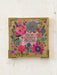 Decorative box with floral design and motivational text on a white background