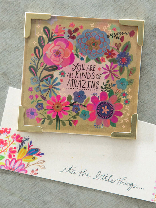 Floral card with colorful flowers and text on a gray background