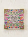Decorative card with floral design and text on a light background