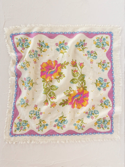 Floral patterned fabric with colorful flowers on a white background