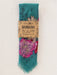 Teal bandana with floral design on a cardboard packaging labeled 'Natural Life'.