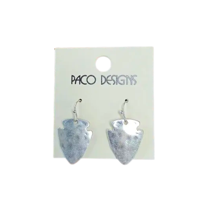 Silver arrowhead-shaped earrings on a Paco Designs card against a white background