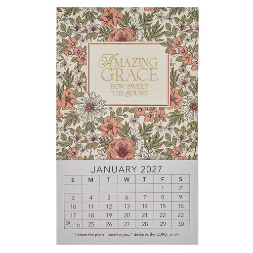 A vertical wall calendar page for January 2027 with a floral border and the title 'Amazing Grace How Sweet the Sound' at the top. The upper portion shows an illustrated floral pattern in muted pink, green, and cream tones, while the lower portion is a light gray calendar grid with day numbers and a Bible verse printed at the bottom.