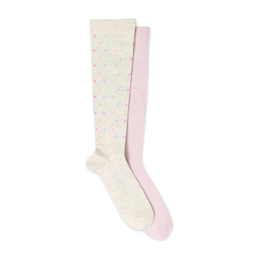 Two pairs of knee-high socks, one cream with multicolored dots and one pink, on a white background.