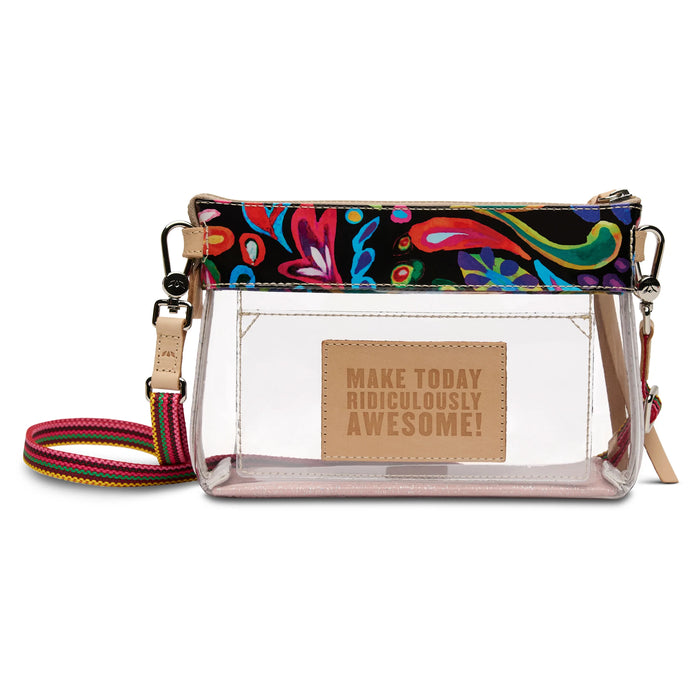 A clear PVC crossbody bag with a colorful paisley patterned top band, a matching multicolor woven strap, and a tan faux-leather patch on the front that reads 'MAKE TODAY RIDICULOUSLY AWESOME!'.