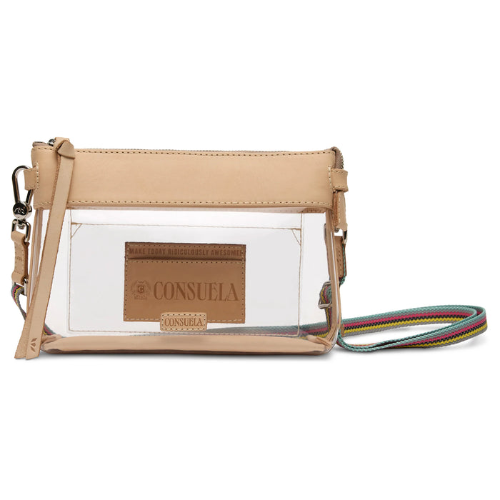 A beige clear plastic crossbody bag with a colorful striped wristlet strap, featuring a tan leather brand patch that reads 'CONSUELA'.