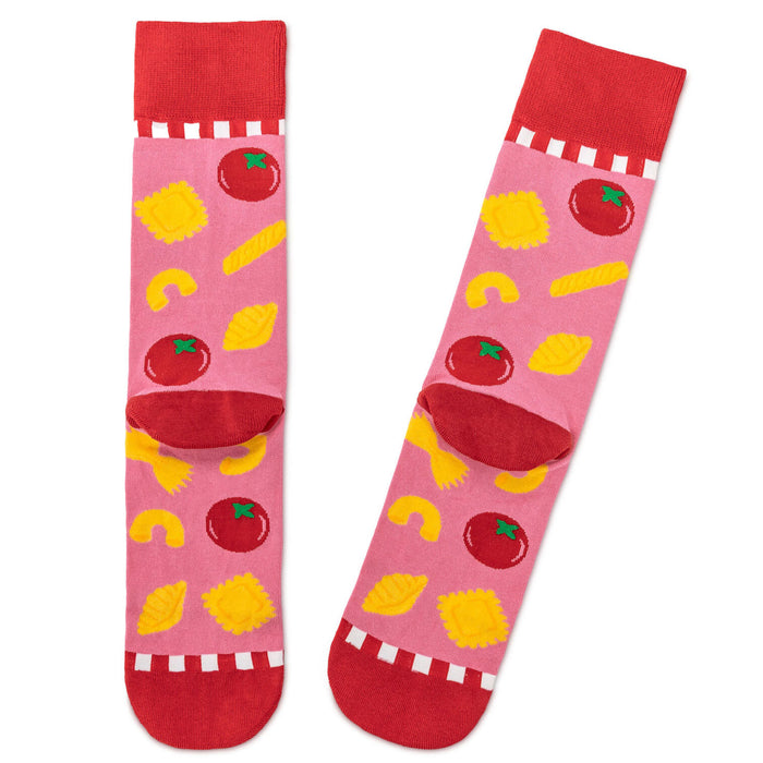 Colorful socks with fruit patterns on a white background