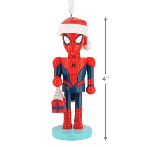 Spider-Man Christmas ornament with a Santa hat and gift, with a measurement label indicating its size.