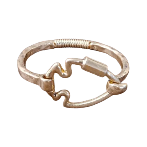 Gold ring with a unique design on a white background